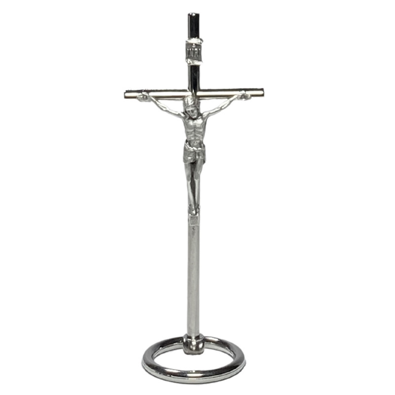 Face avant croix à poser H.10,5cm forme cylindrique avec Christ, en métal argenté Face avant croix à poser H.10,5cm forme cylindrique avec Christ, en métal argenté